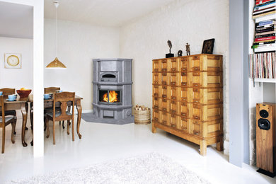 Photo of a large scandi living room in Gloucestershire with a wood burning stove.