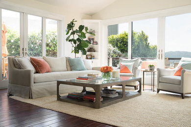 Example of a mid-sized trendy formal and open concept dark wood floor and brown floor living room design in San Francisco with beige walls, no fireplace and no tv