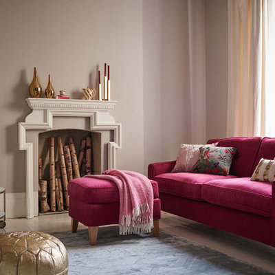 Example of a transitional painted wood floor living room design in Berkshire with gray walls and no tv