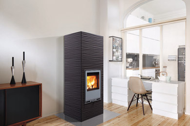 This is an example of a scandi living room in Gloucestershire with a wood burning stove.