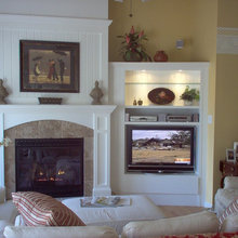 tv next to the fireplace
