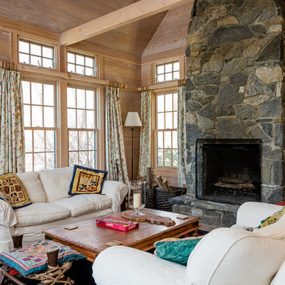 Example of a mid-sized cottage open concept living room design in Boston with a stone fireplace, a standard fireplace and no tv