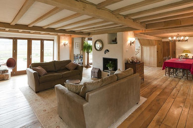Design ideas for a rustic living room in Sussex.