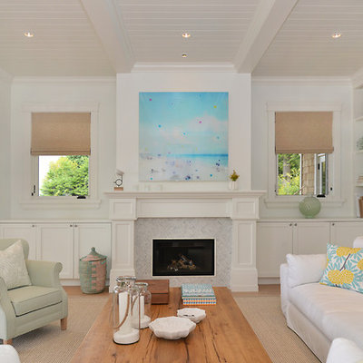 Inspiration for a coastal formal light wood floor living room remodel in Vancouver with white walls, a ribbon fireplace and a tile fireplace