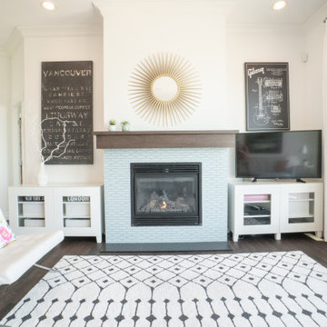 Creamy white Living room with updated Fireplace