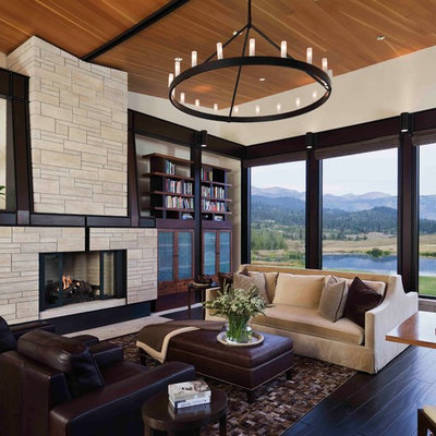 Example of a mid-sized trendy formal and open concept dark wood floor and brown floor living room design in Other with a stone fireplace, white walls, a standard fireplace and no tv