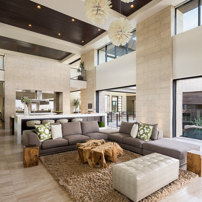 Huge trendy open concept living room photo in Las Vegas with white walls