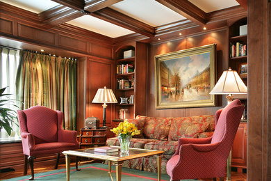 Inspiration for a timeless living room library remodel in New York with brown walls