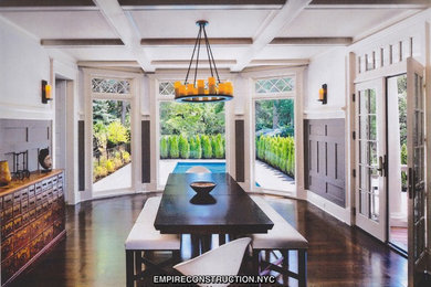 Inspiration for a huge craftsman medium tone wood floor dining room remodel in New York with a wood stove, a stone fireplace and blue walls