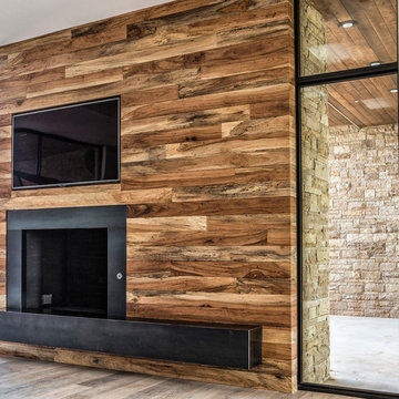 Custom pecan wall w fireplace and tv