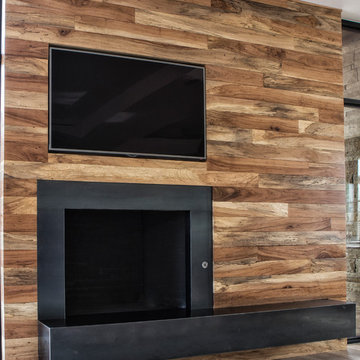 Custom pecan wall w fireplace and tv