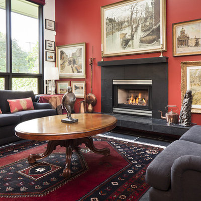 Inspiration for an eclectic living room remodel in Vancouver with red walls
