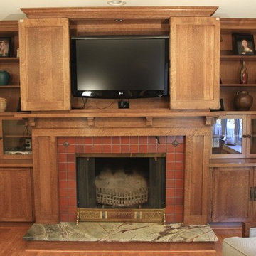 Custom Woodworking - Fireplace Mantel with Bookcases and Television Cabinet.