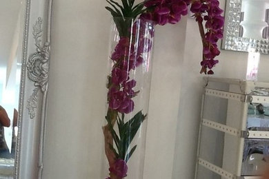 Cylinder 55" arrangement w/ purple orchids hand made
