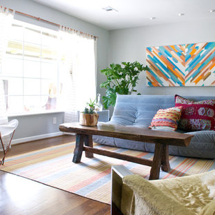Eclectic dark wood floor living room photo in Dallas with gray walls