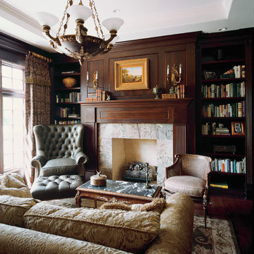 Dark Cherry Stained Library with Tray Ceiling and Stone Slab Surround Flush Fire