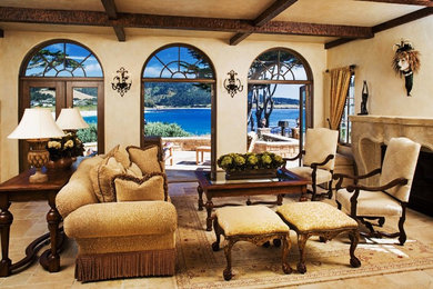 Mid-sized tuscan formal and open concept beige floor and limestone floor living room photo in Seattle with beige walls, a standard fireplace, a stone fireplace and no tv