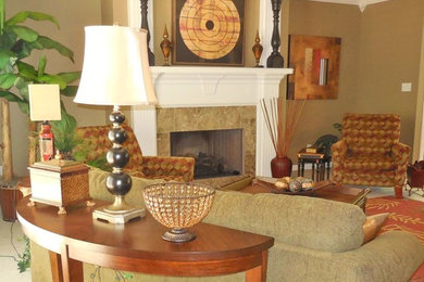 Example of a mid-sized transitional enclosed carpeted living room design in Little Rock with a standard fireplace, a stone fireplace and beige walls