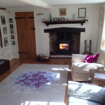 Deirdre Dyson DEVILS BIT SCABIOUS rug in a cosy cottage sitting room