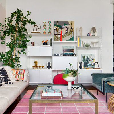 Living room - eclectic dark wood floor living room idea in San Francisco with white walls