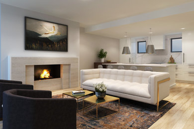 Example of a minimalist open concept living room design in Calgary with a standard fireplace and a tile fireplace
