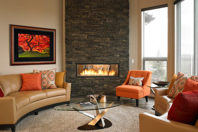 Photo of a large contemporary open plan living room in Calgary with beige walls, porcelain flooring, a two-sided fireplace and a stone fireplace surround.