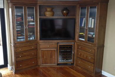 This is an example of a large classic enclosed living room in Minneapolis with a built-in media unit.
