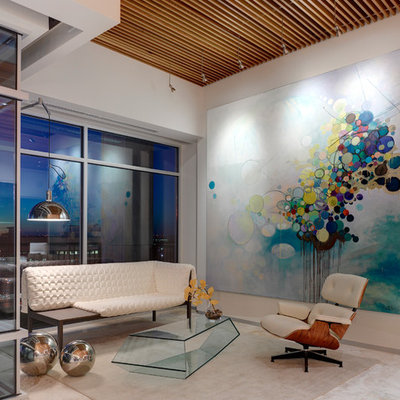 Example of a mid-sized trendy open concept travertine floor living room design in Indianapolis with white walls