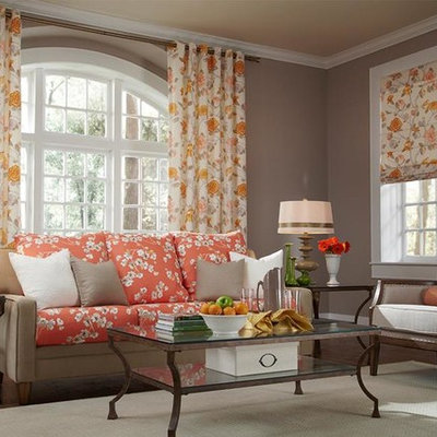 Inspiration for a mid-sized timeless formal and enclosed dark wood floor and brown floor living room remodel in New York with gray walls, no fireplace and no tv