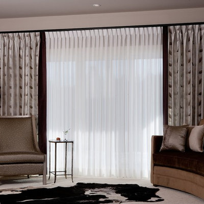 Living room - mid-sized traditional formal and enclosed carpeted and gray floor living room idea in Toronto with beige walls, no fireplace and no tv