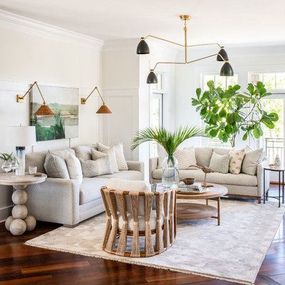 Beach style open concept and formal medium tone wood floor living room photo in Other with white walls