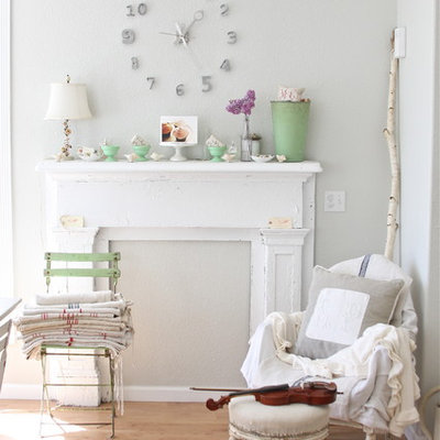 Living room - shabby-chic style medium tone wood floor living room idea in Other with gray walls
