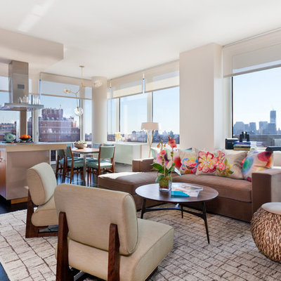 Inspiration for a large contemporary open concept dark wood floor and brown floor living room remodel in New York with white walls, no fireplace, a plaster fireplace and a wall-mounted tv