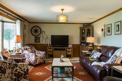 Photo of a medium sized country enclosed living room in Columbus with beige walls, carpet, no fireplace and a freestanding tv.