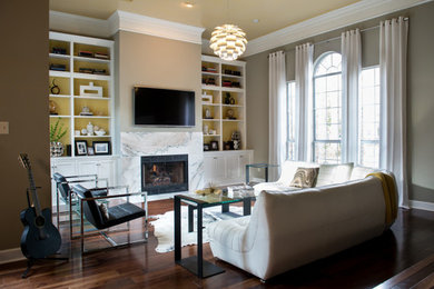 Example of a large trendy open concept dark wood floor living room design in New Orleans with gray walls, a standard fireplace, a stone fireplace and a wall-mounted tv