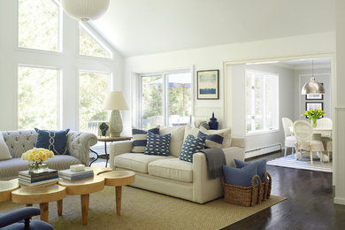 Design ideas for a beach style formal open plan living room in New York with feature lighting.