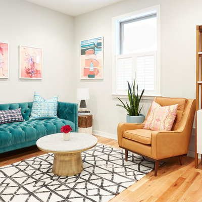 Living room - mid-sized eclectic open concept light wood floor and beige floor living room idea in Philadelphia with gray walls, no fireplace and no tv