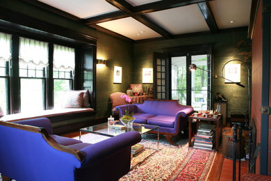 Example of a mid-sized eclectic ceramic tile living room design in Other with green walls