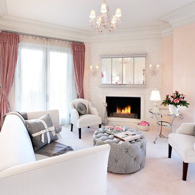 Living room - eclectic living room idea in Las Vegas with pink walls and a corner fireplace