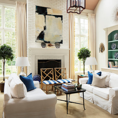 Inspiration for an eclectic formal and enclosed carpeted and beige floor living room remodel in New York with white walls, a standard fireplace, a brick fireplace and no tv