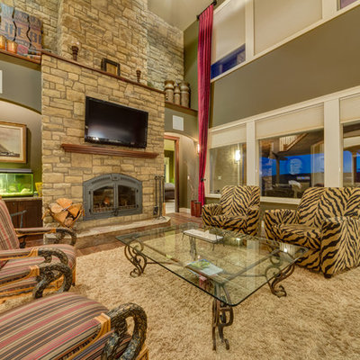 Living room - traditional living room idea in Calgary with green walls