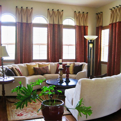 Living room - mid-sized traditional formal and enclosed dark wood floor and brown floor living room idea in Austin with beige walls, no fireplace and no tv