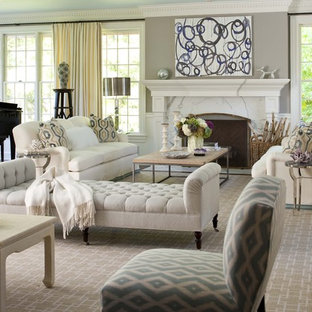 Example of a classic living room design in New York with a music area and gray walls
