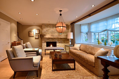 Living room - transitional enclosed living room idea in Philadelphia with a ribbon fireplace and a stone fireplace