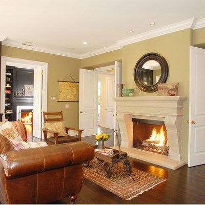 Elegant living room photo in Los Angeles with green walls