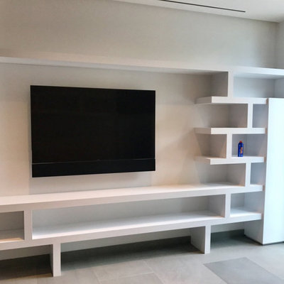 Minimalist living room photo in Miami with a media wall