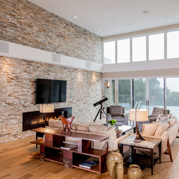 Expansive Living Room in Passive House with Floor-to-Ceiling Windows