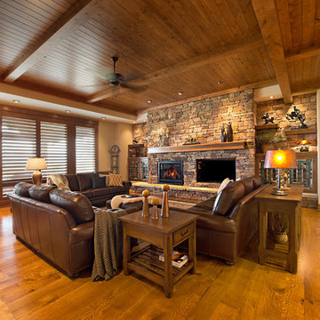Expansive Living Room with Stacked stone fireplace