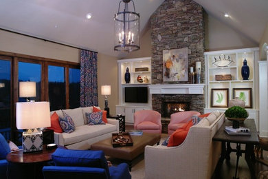 На фото: парадная, изолированная гостиная комната среднего размера в современном стиле с стандартным камином, фасадом камина из камня, разноцветными стенами и паркетным полом среднего тона без телевизора с