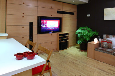 Example of an asian living room design in Other